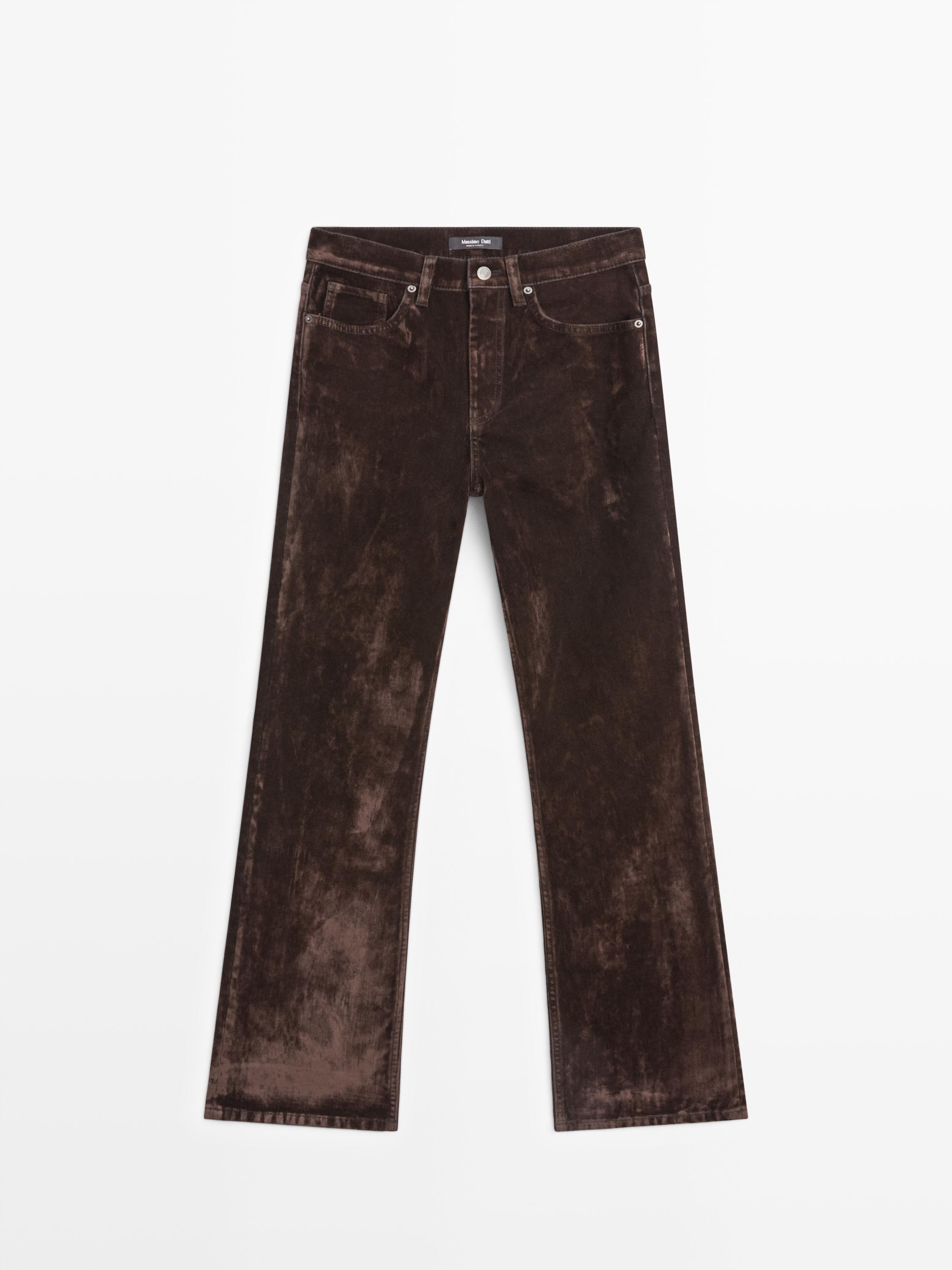 High-waist flocked boot-cut jeans